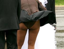A girl in white dress in this upskirt gall Image 1