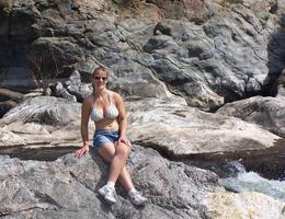 This beautiful chubby woman posing naked on the rocks is my new girlfriend! Image 7