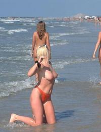 A bikini bitch going topless on the Vera Playa Image 12
