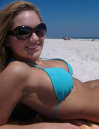 A busty bikini lady undressing on the Cancun Image 11