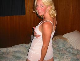 Wife in white lingerie with a shaven cunt images Image 3