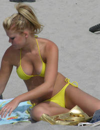 A bikini lady going topless on the Daytona Image 6